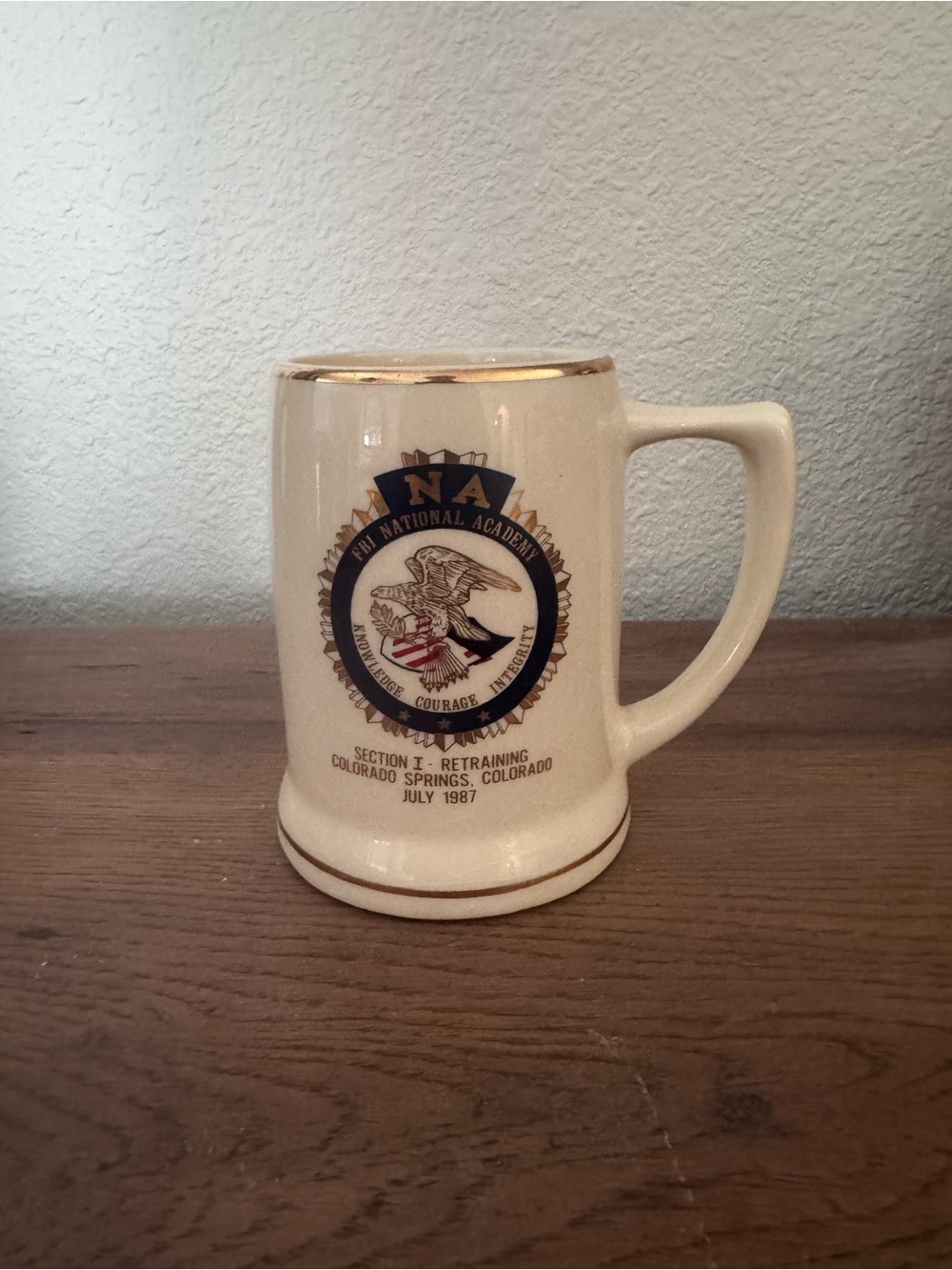 Cream Ceramic Beer Stein Mug with Gold Trim and Red Eagle Motif